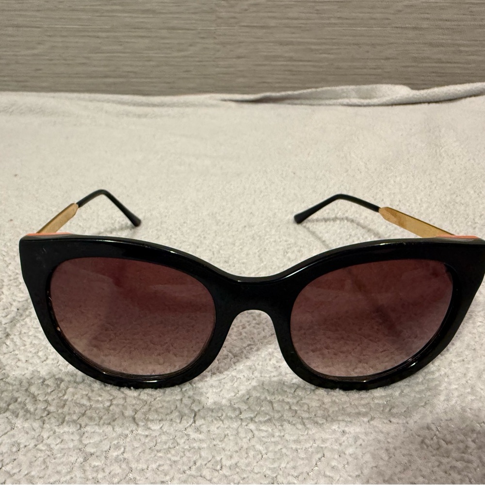 THIERRY LASRY Stylish Black, Orange and Gold Sunglasses